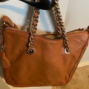 100% leather GILI bag.  Never used.  Wear with chain straps, or crossbody
